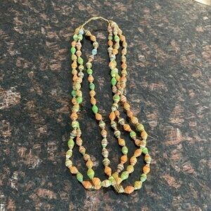 Hand made beads recycled paper by women in Uganda